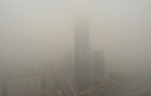 The 75-storey high landmark skyscraper of Shenyang is seen during a smoggy day in Liaoning province